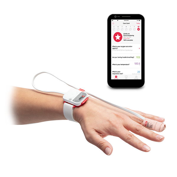 Patient forearm and hand wearing the SafteyNet product around their wrist and finger iphone displaying safetyNet app is adjacent to the patients hand