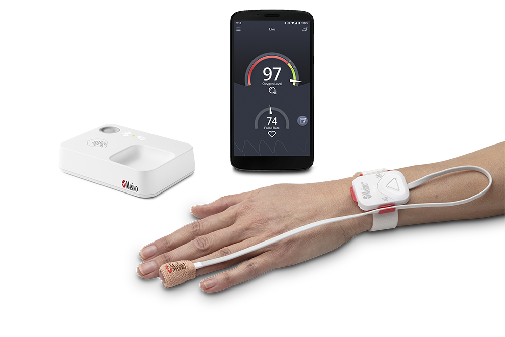 Group shot of Masimo SafetyNet Alert with app on phone and sensor on wrist