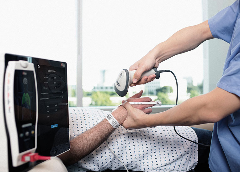 Masimo - Patient SafetyNet General Floor Root with NIBPT patient being scanned in