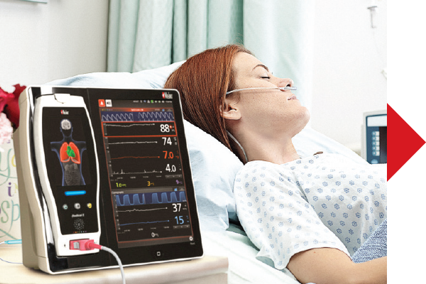 Masimo - Configure alarm thresholds - woman laying hospital bed with device